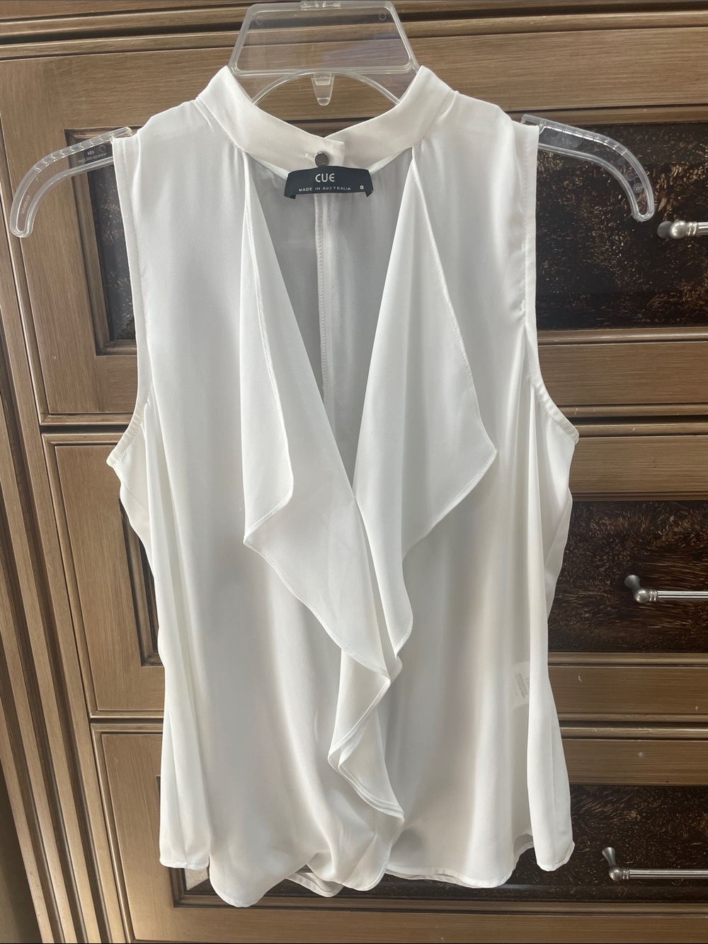 CUE White Ruffle-Front Sleeveless blouse